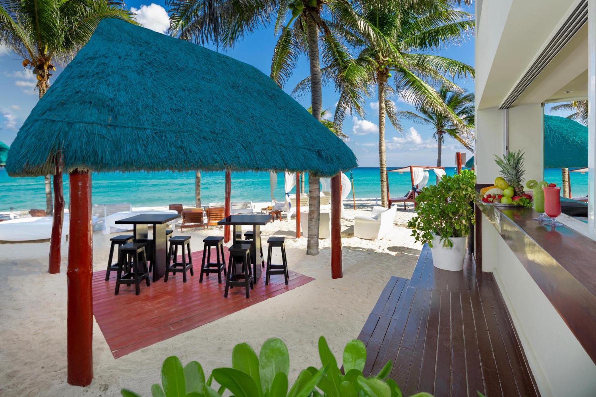 The Pyramid Cancun By Oasis Exterior photo Beach bar at the Grand Palladium Hotel, Playa del Carmen, Mexico